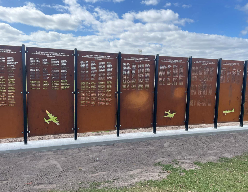 Corten steel memorial wall with military honour panels, a custom project by Oasis Landscape Construction and Fencing, Hervey Bay.